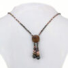 Collier talisman en bois et métal