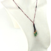 Collier lariat en perles dOnyx et accents verts, bijou fait main élégant.