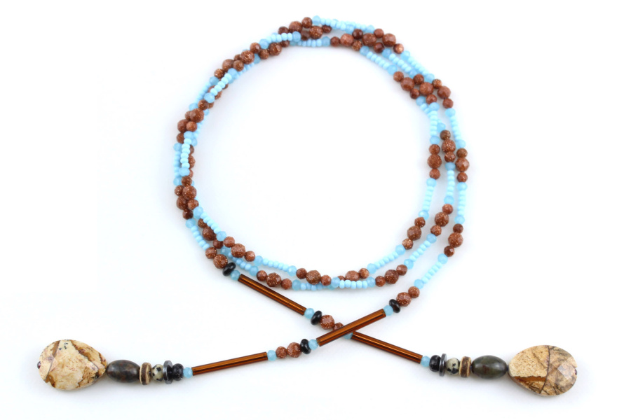 Lariat azul y naranja en cuentas de jaspe - Una armonía de contrastes y destellos