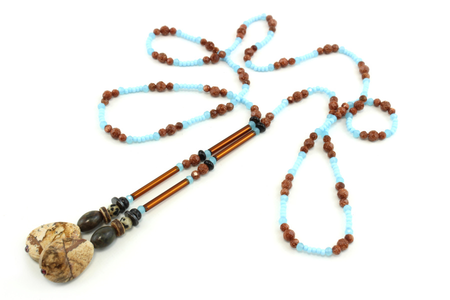 Lariat azul y naranja en cuentas de jaspe - Una armonía de contrastes y destellos